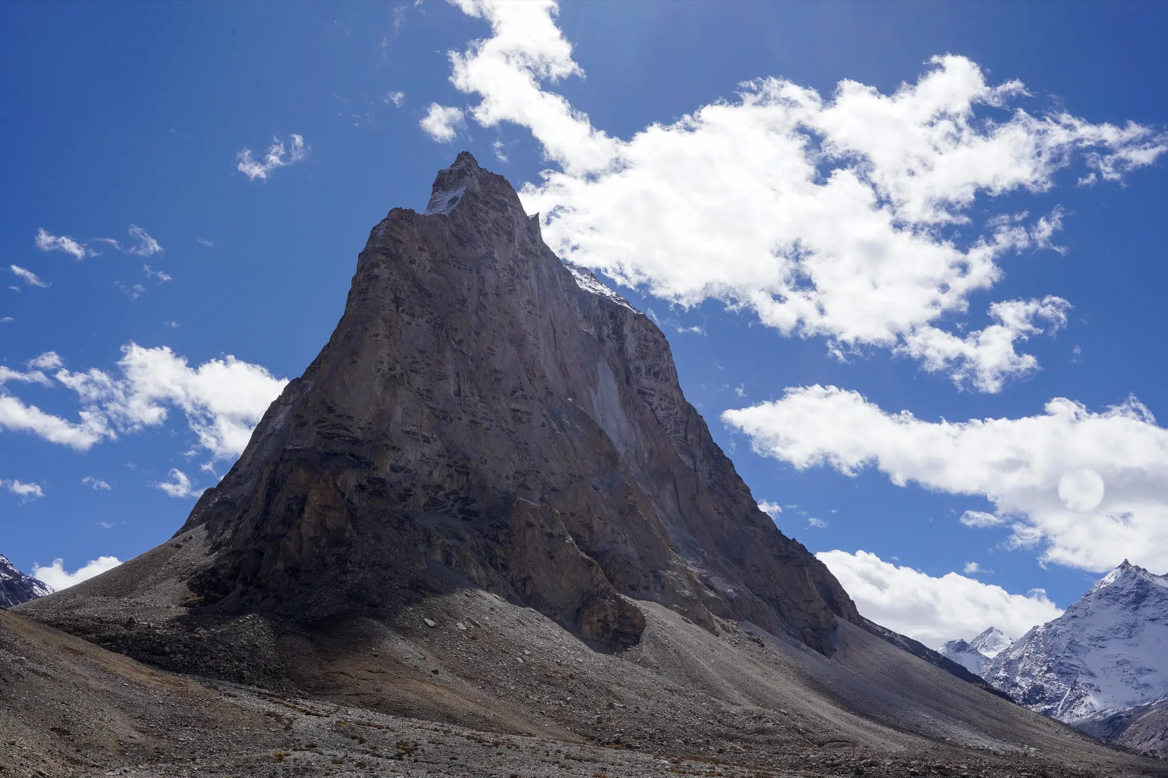 The rock tower of Gonbo Rangjon rising above the Kargyak valley in Zanskar, seen from the north