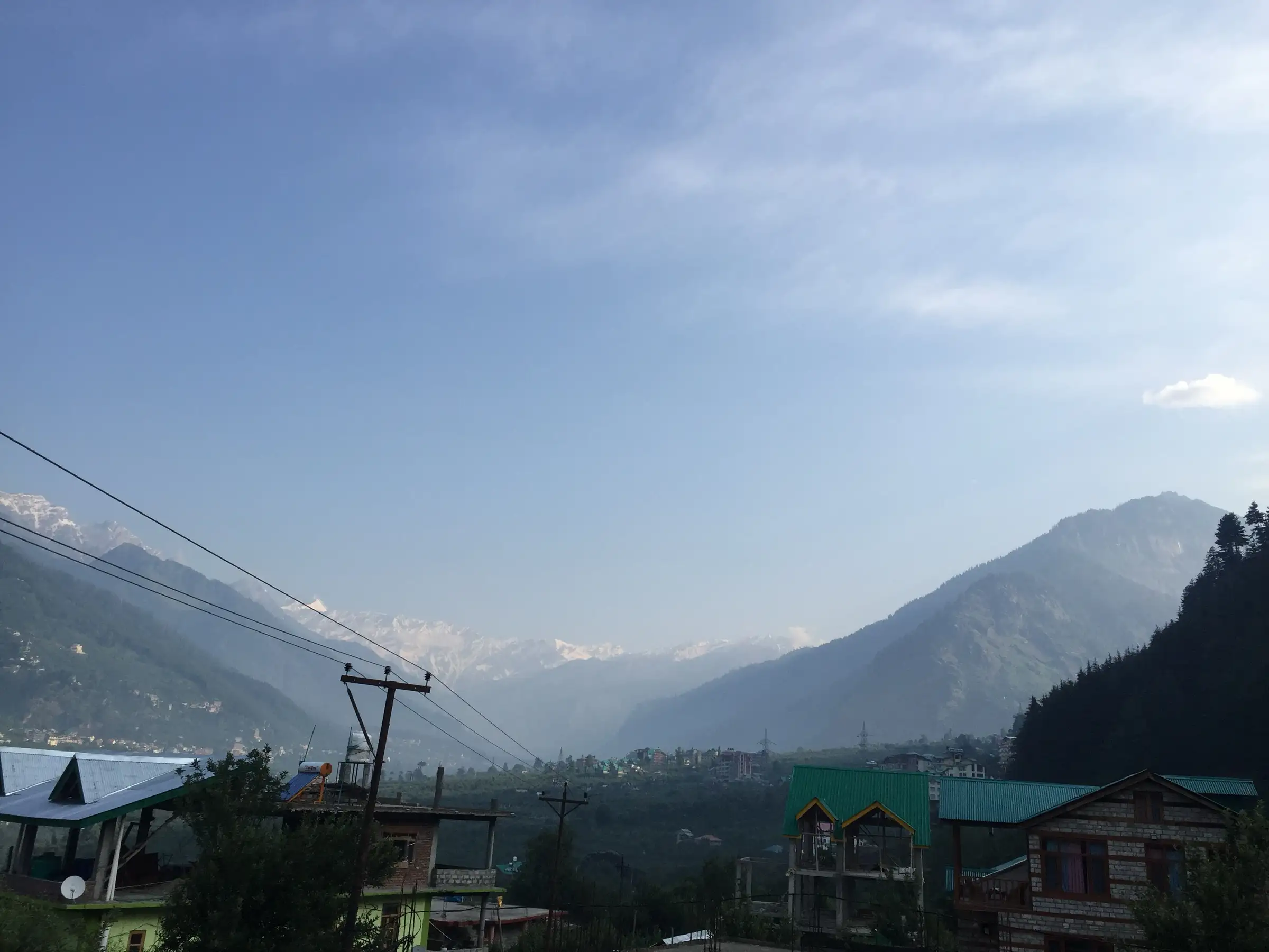 Snow peaks at the head of the Kullu valley seen from Jagatsukh village, where the climb starts; a view of the area, not the trail itself