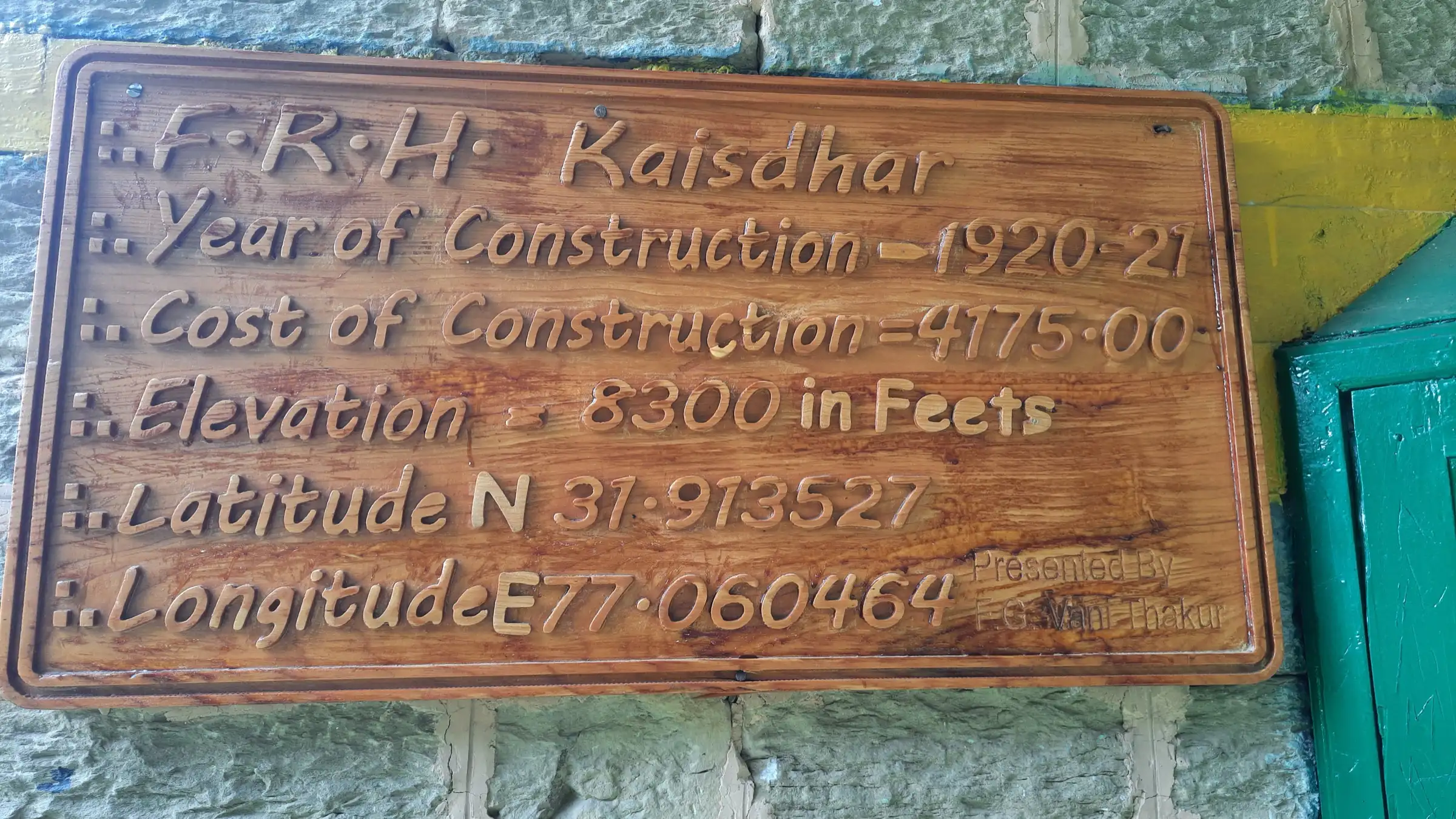 Carved wooden board at FRH Kaisdhar giving its 1920-21 construction year and an elevation of 8,300 feet