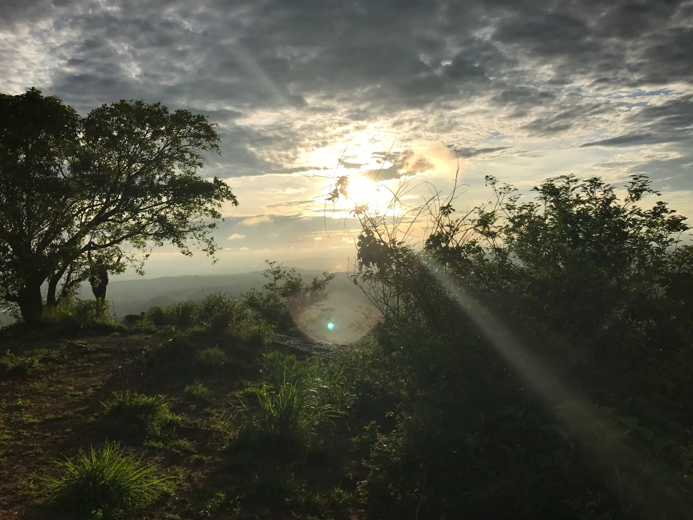Sunrise over the hills near Ramanagara, seen from Narayanagiri hill about 4 km north of Kunagalu Betta. This photo does not show the Kunagalu Betta trail.