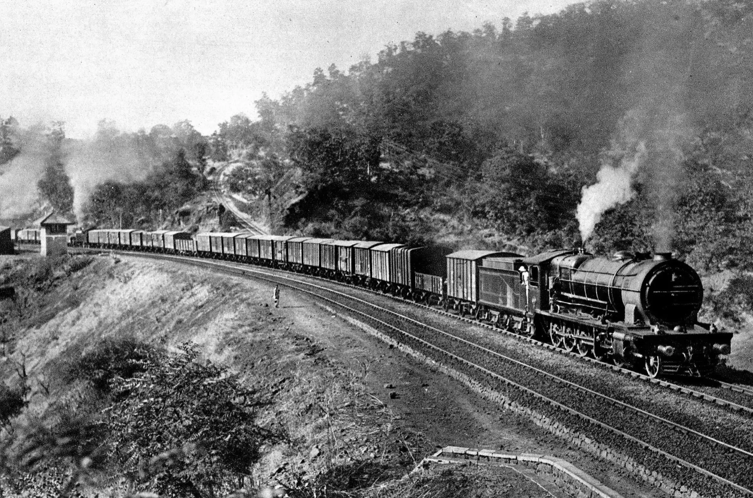 A 1924 photograph of a steam goods train climbing the Thal Ghat railway incline near Kasara, below Balwantgad (not the fort itself)