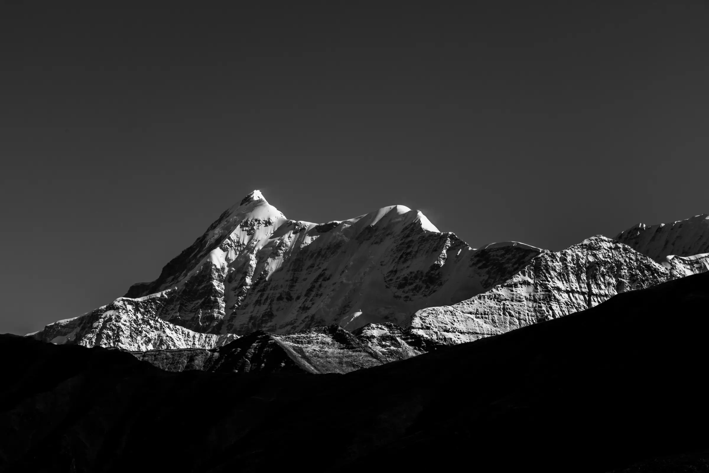 Black-and-white view of the snowy Trishul massif seen from Bedni Bugyal