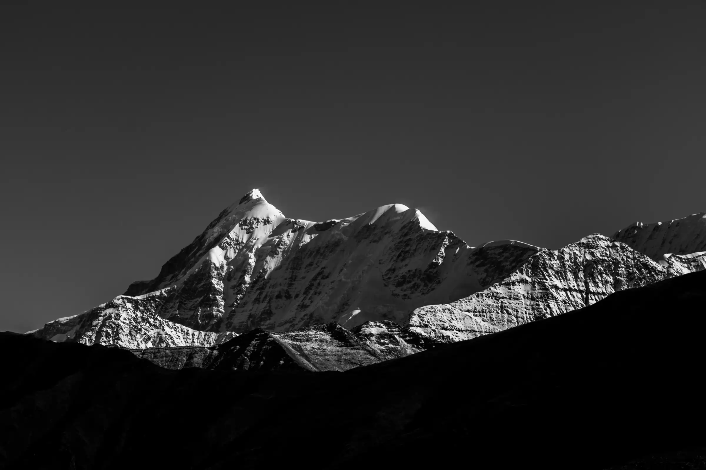 Black-and-white view of the snowy Trishul massif seen from Bedni Bugyal