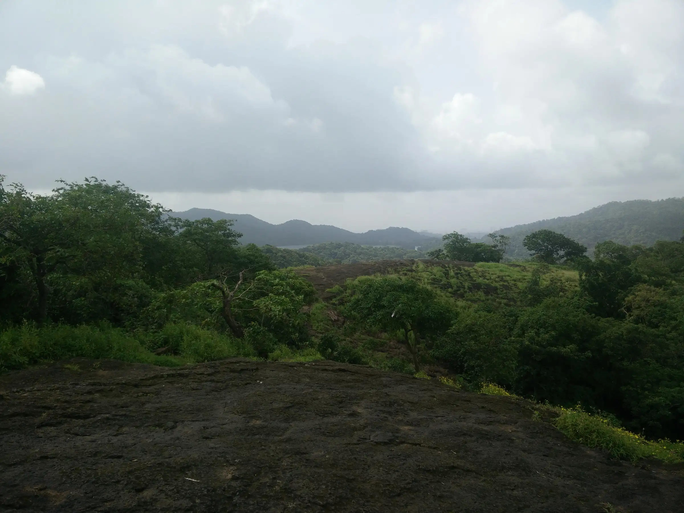 View over forested hills of Sanjay Gandhi National Park to Tulsi Lake, one of the lakes seen from the Jambulmal trail (not taken from the summit)