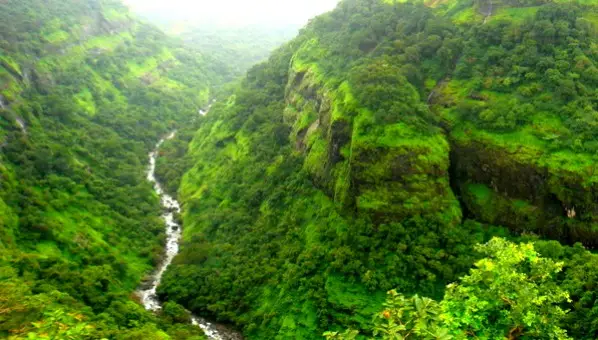 The Ulhas river running through a deep green gorge in monsoon, in the Ulhas valley near the trek (photographed from the Karjat side)