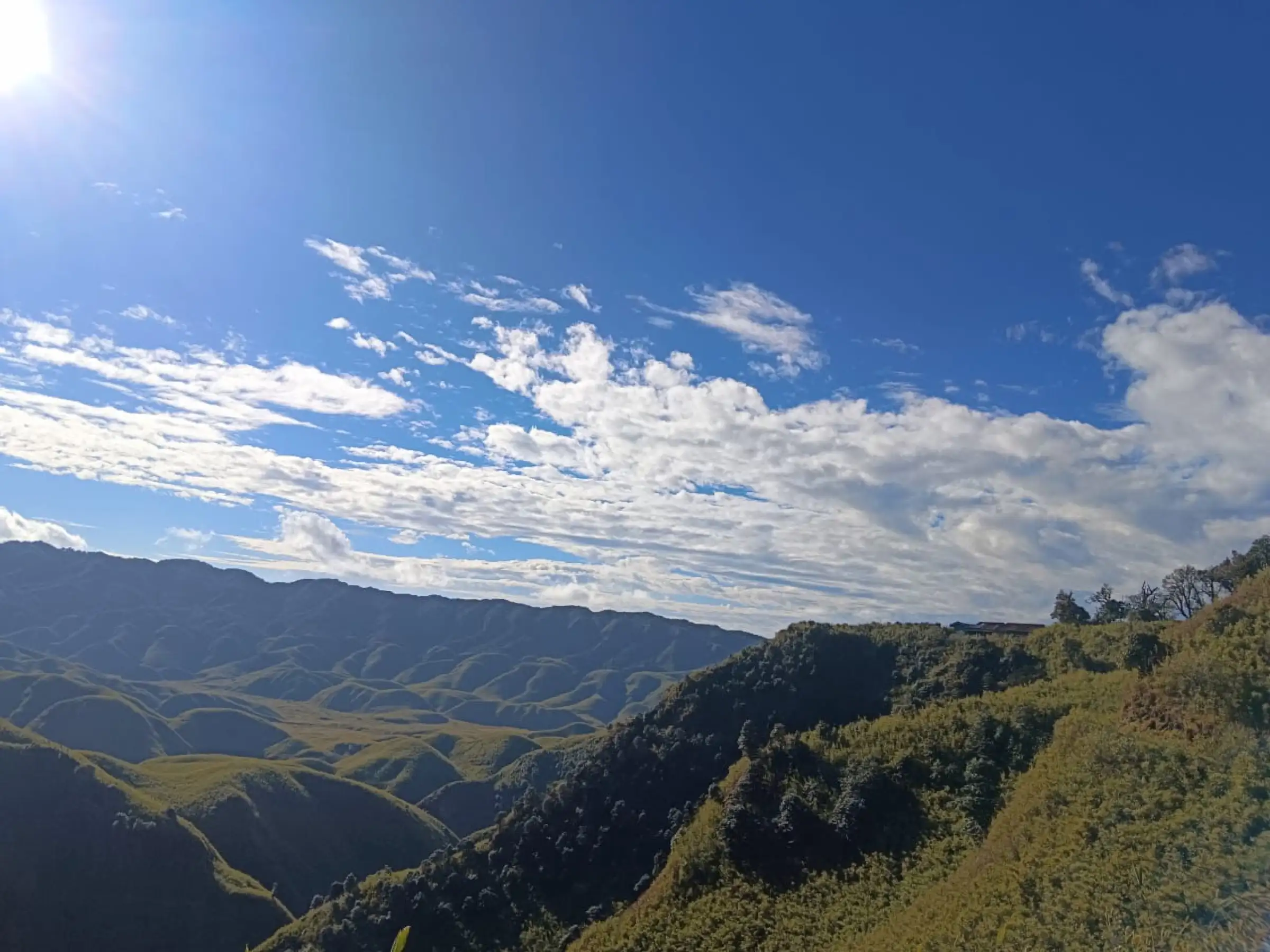 View over the Dzükou basin from the ridge near the guest house on a clear day